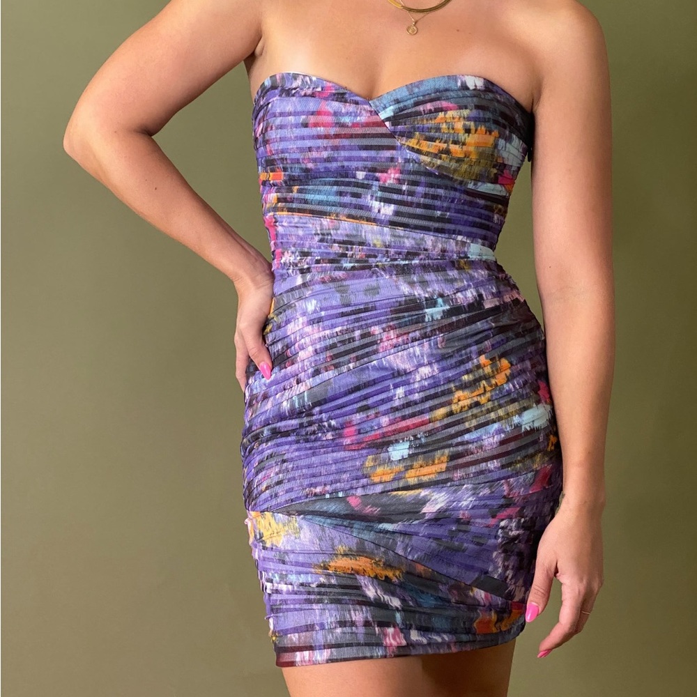 BCBG ruched colorful strapless dress.

Condition: Excellent: No signs of wear.